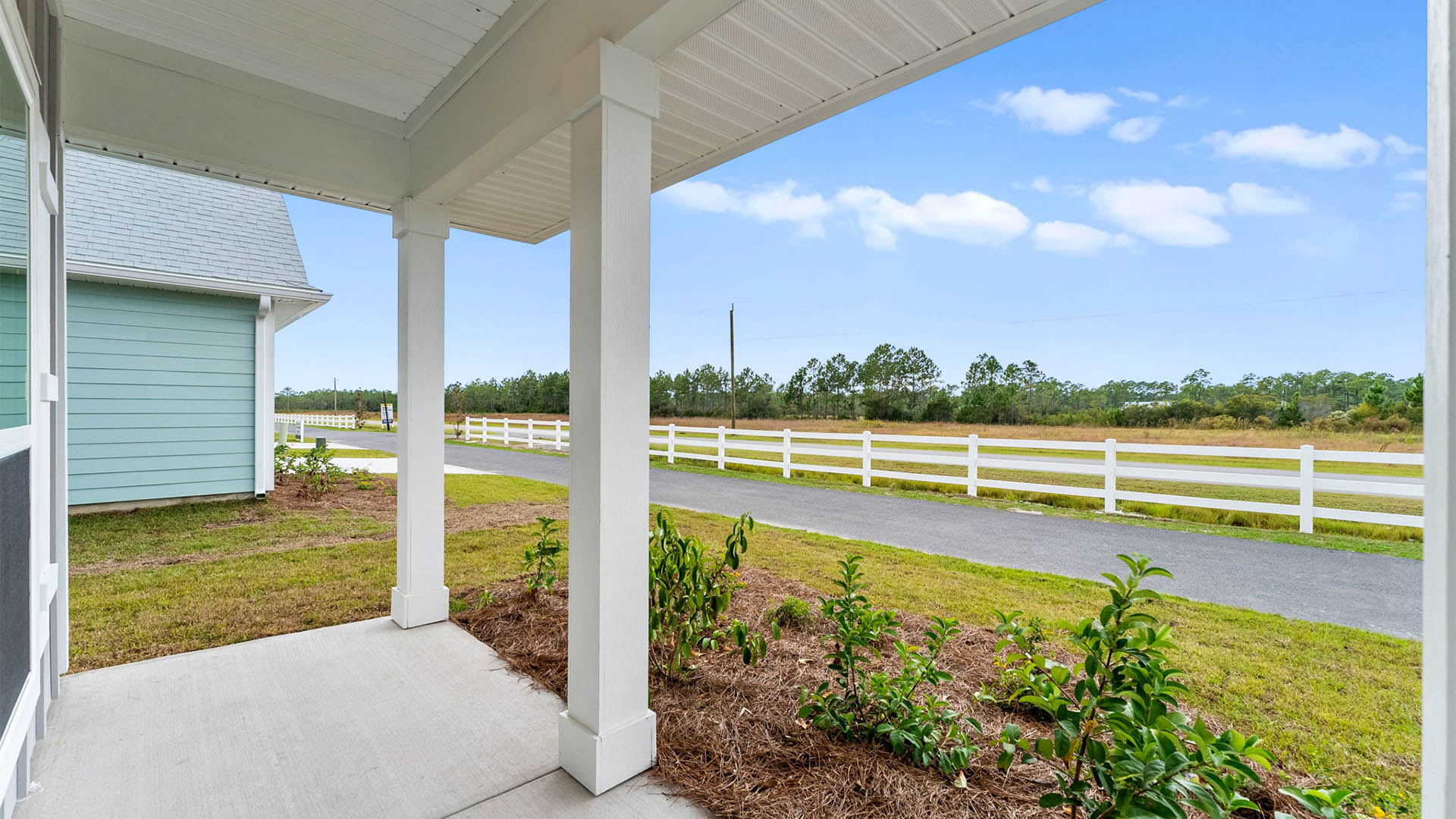 Covered front porch view of Buffer Farms neighborhood.