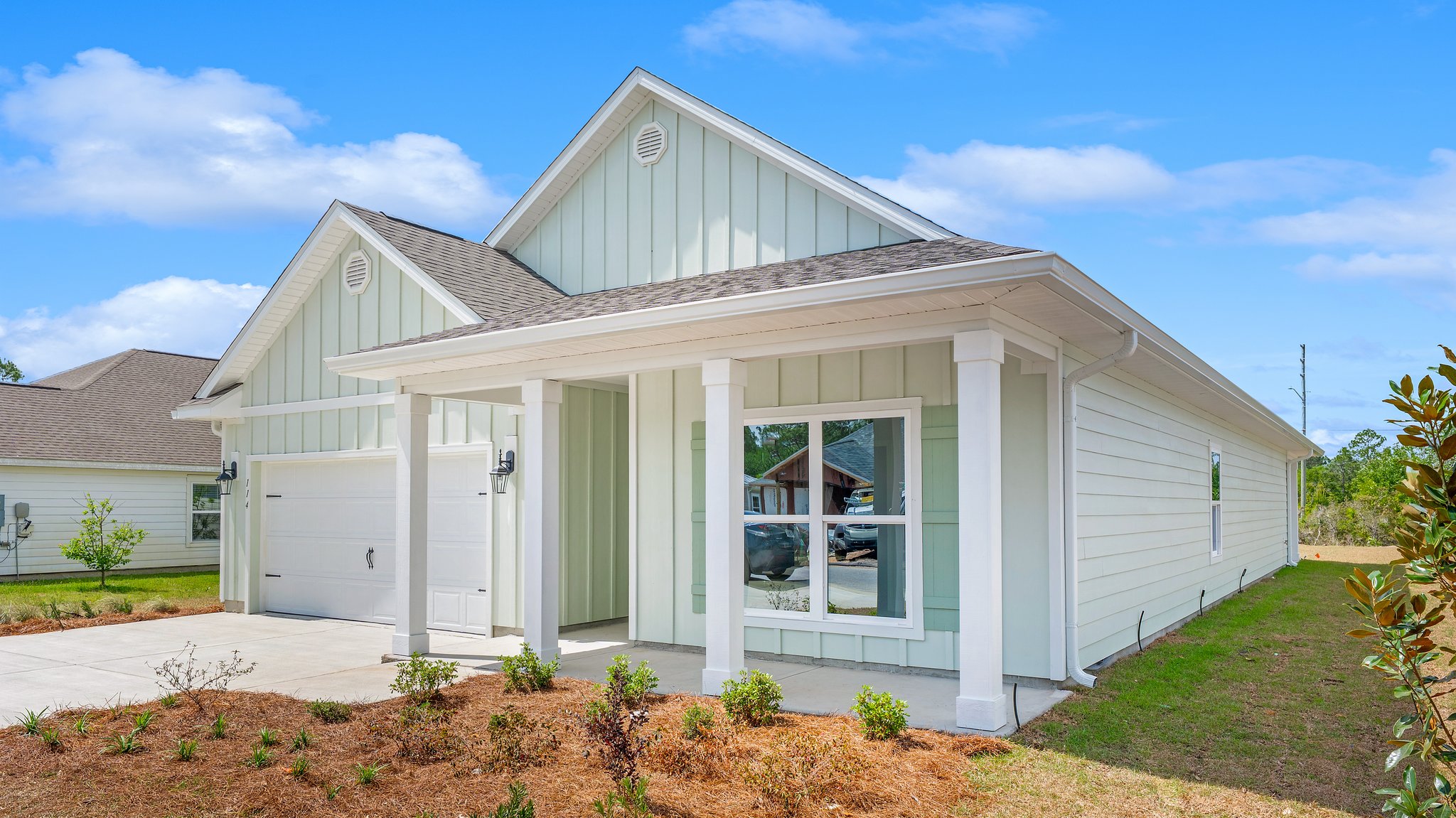 Delray floor plan at Buffer Farms front of home with two car garage.