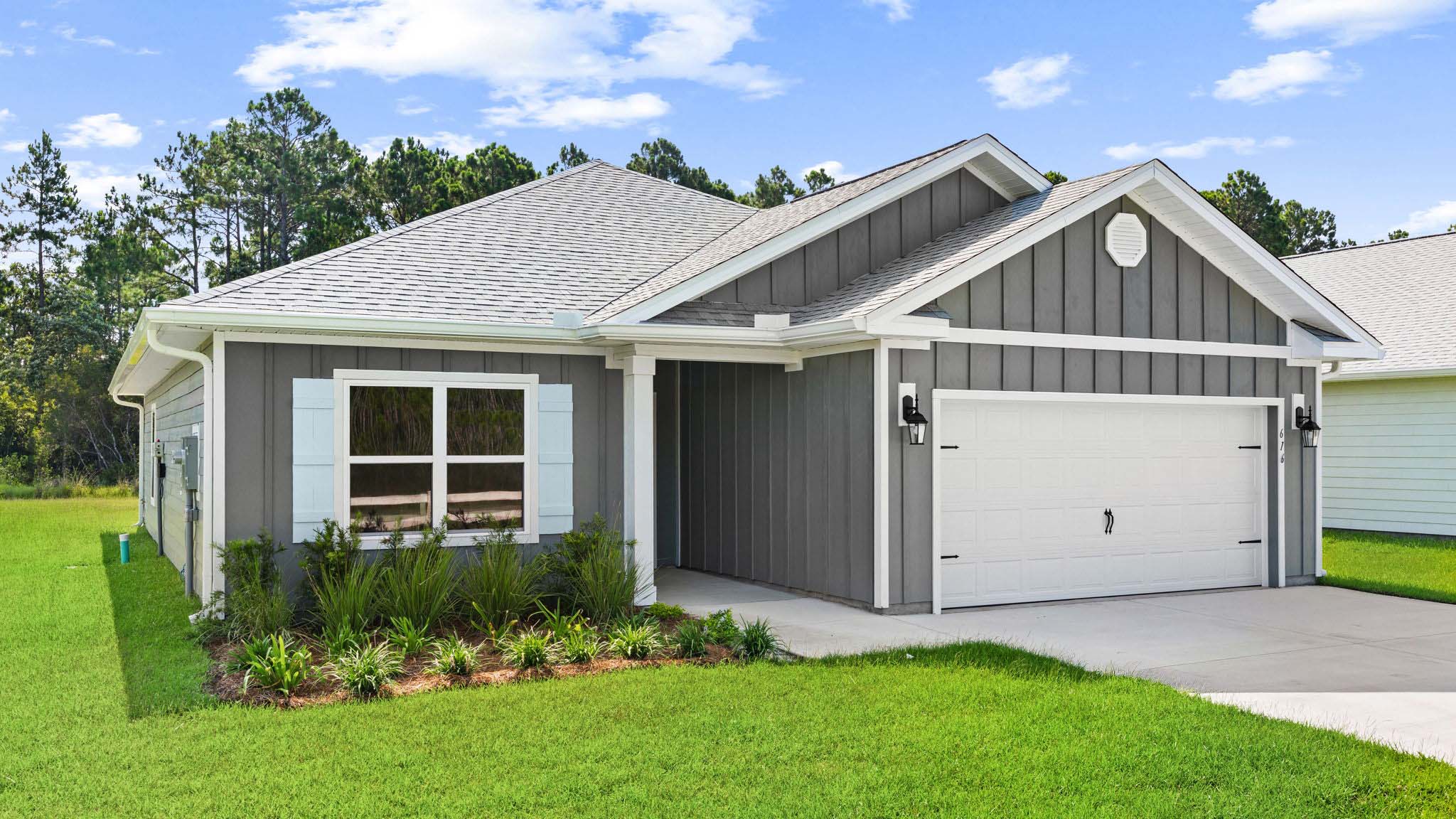 Walker plan at Buffer Farms front of home with Hardie siding and two car garage.