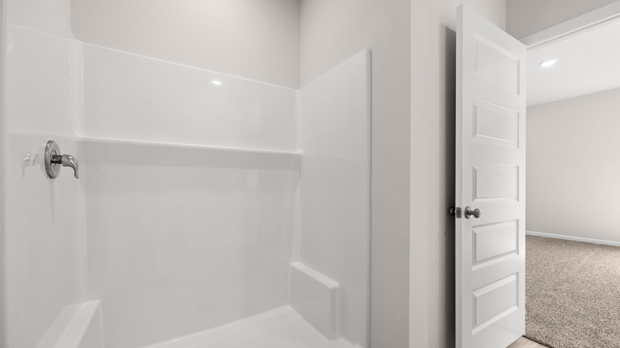 Primary bathroom shower.