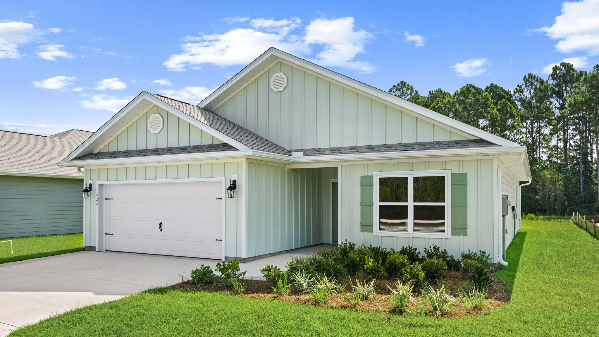 Walker plan at Buffer Farms front of home with Hardie siding and two car garage.