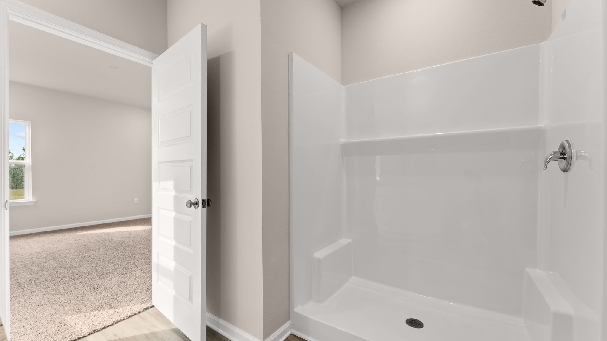 Primary bathroom shower.