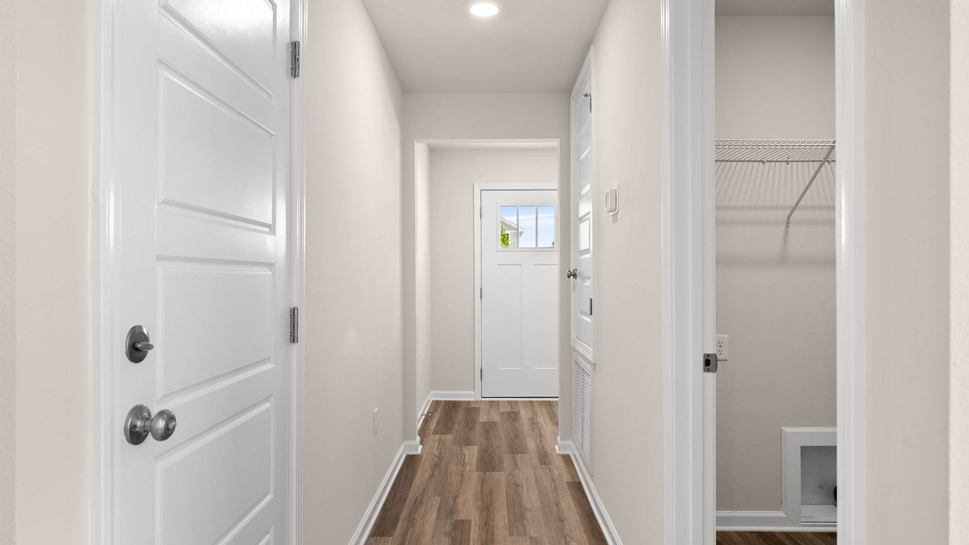 Front hallway next to garage and laundry room.