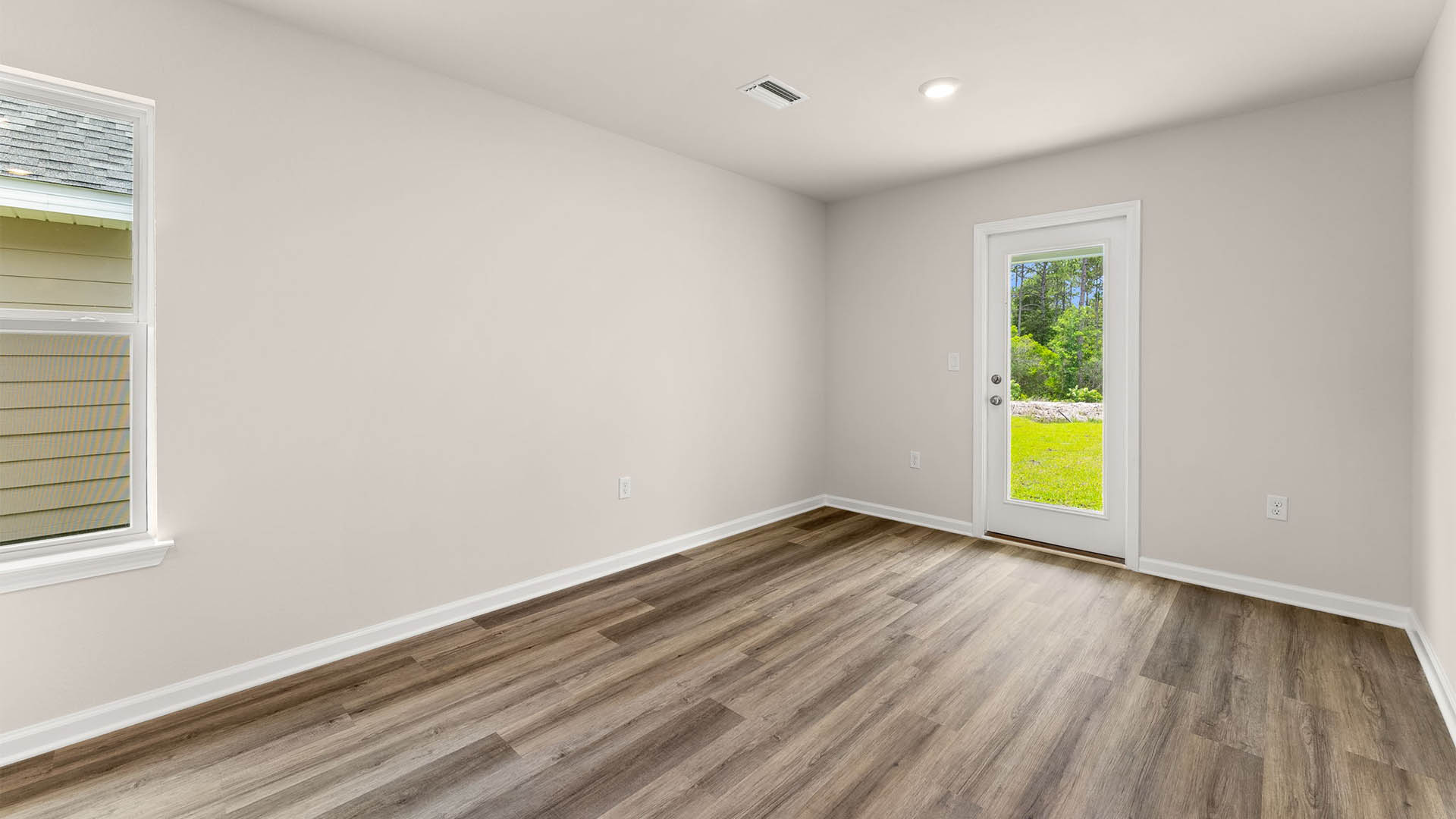 Dining area with back door.