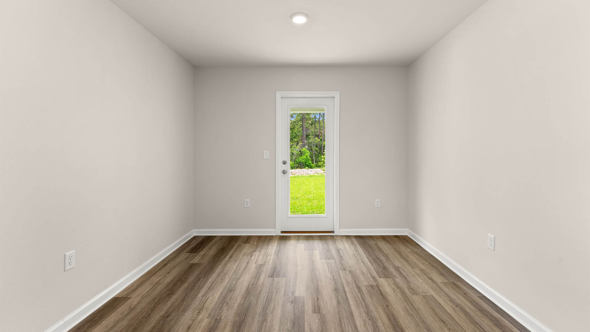 Dining area with back door.