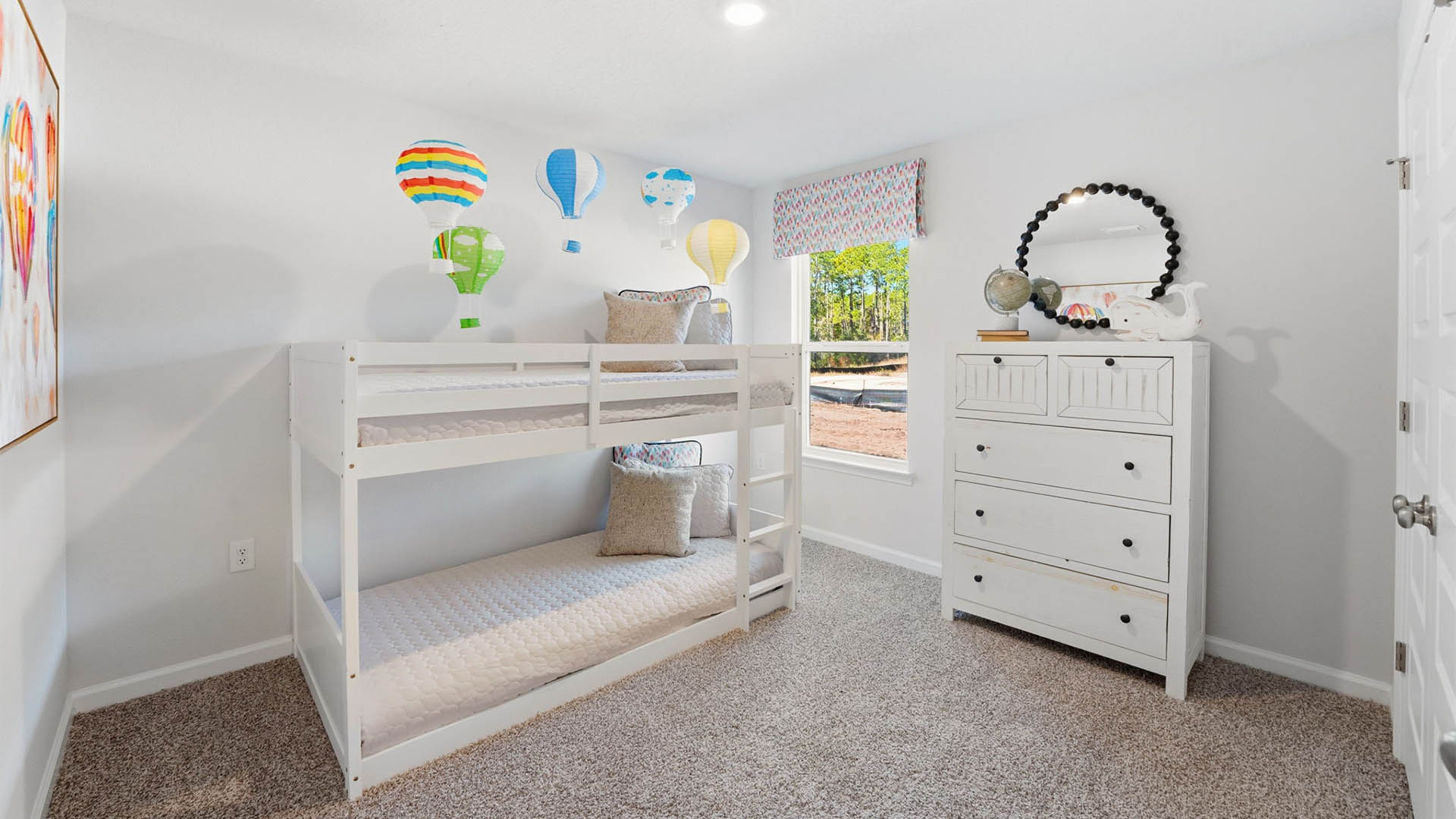 Bedroom with closet and carpet floor and window.