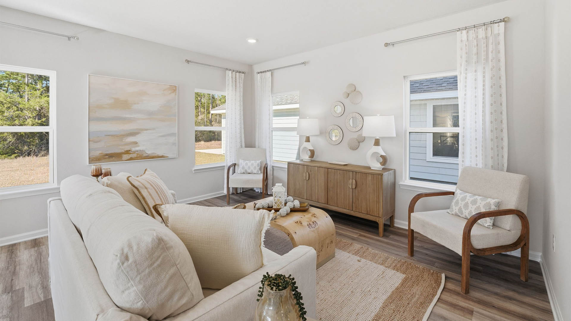 Living room with windows and EVP flooring.
