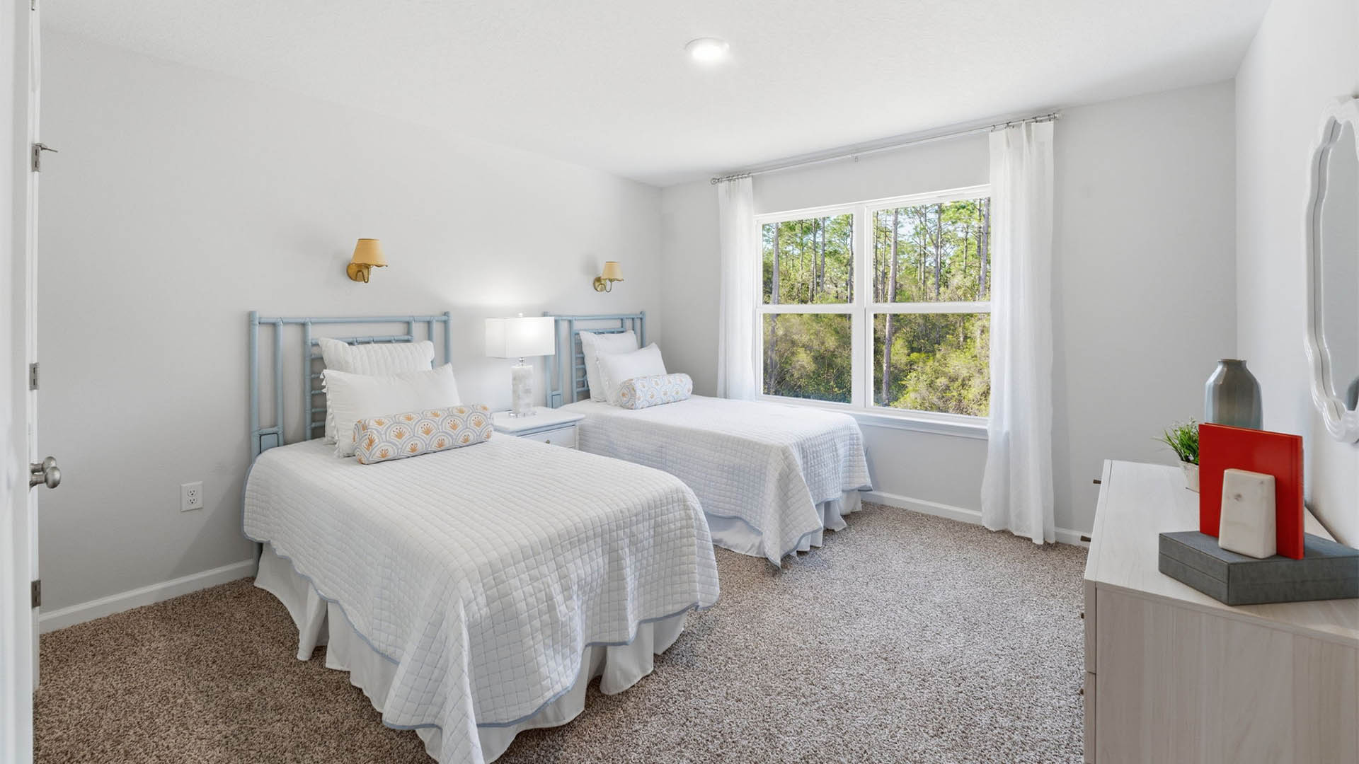Bedroom with carpet floor and window.