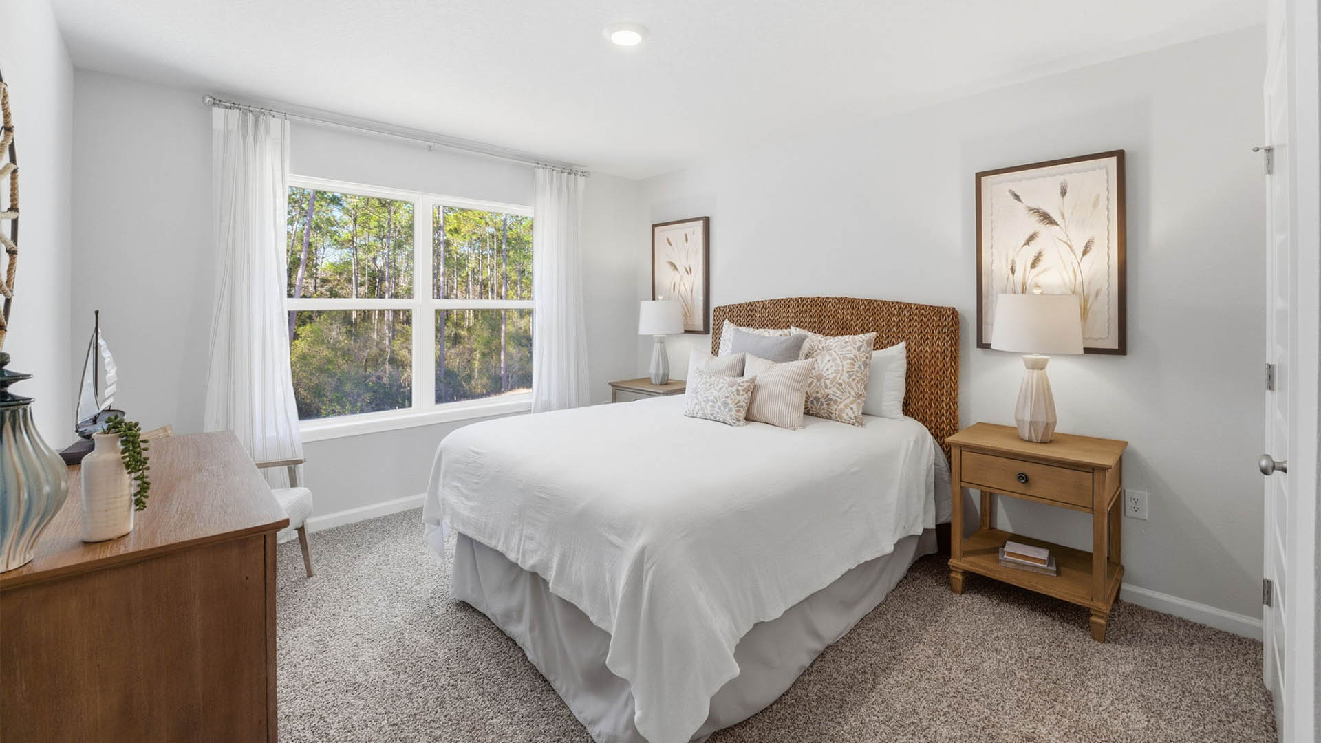 Bedroom with carpet floor and window.