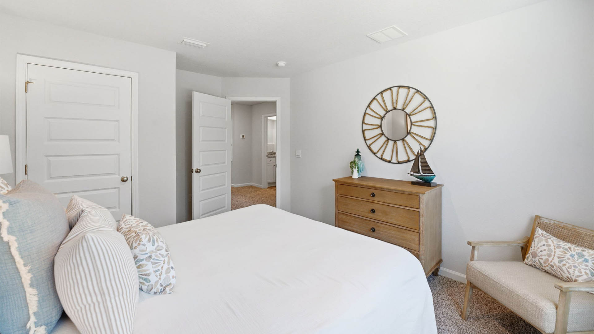 Bedroom with carpet floor and closet.