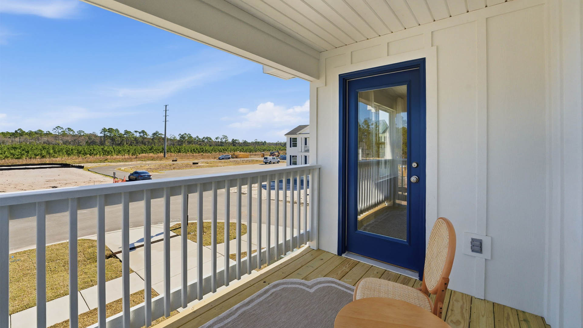 Balcony view of neighborhood by primary bedroom.