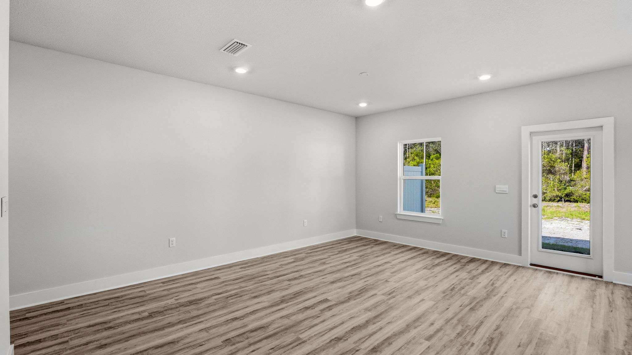 Open living room with EVP flooring.