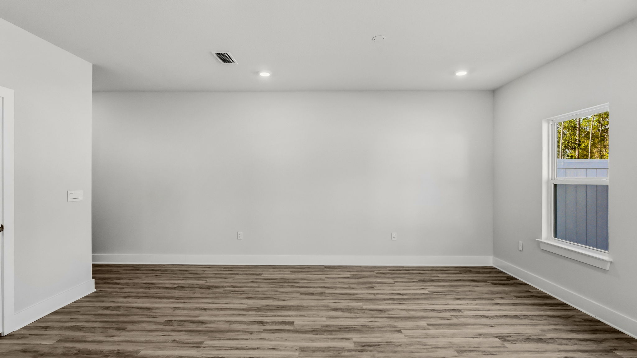 Open living room with EVP flooring.