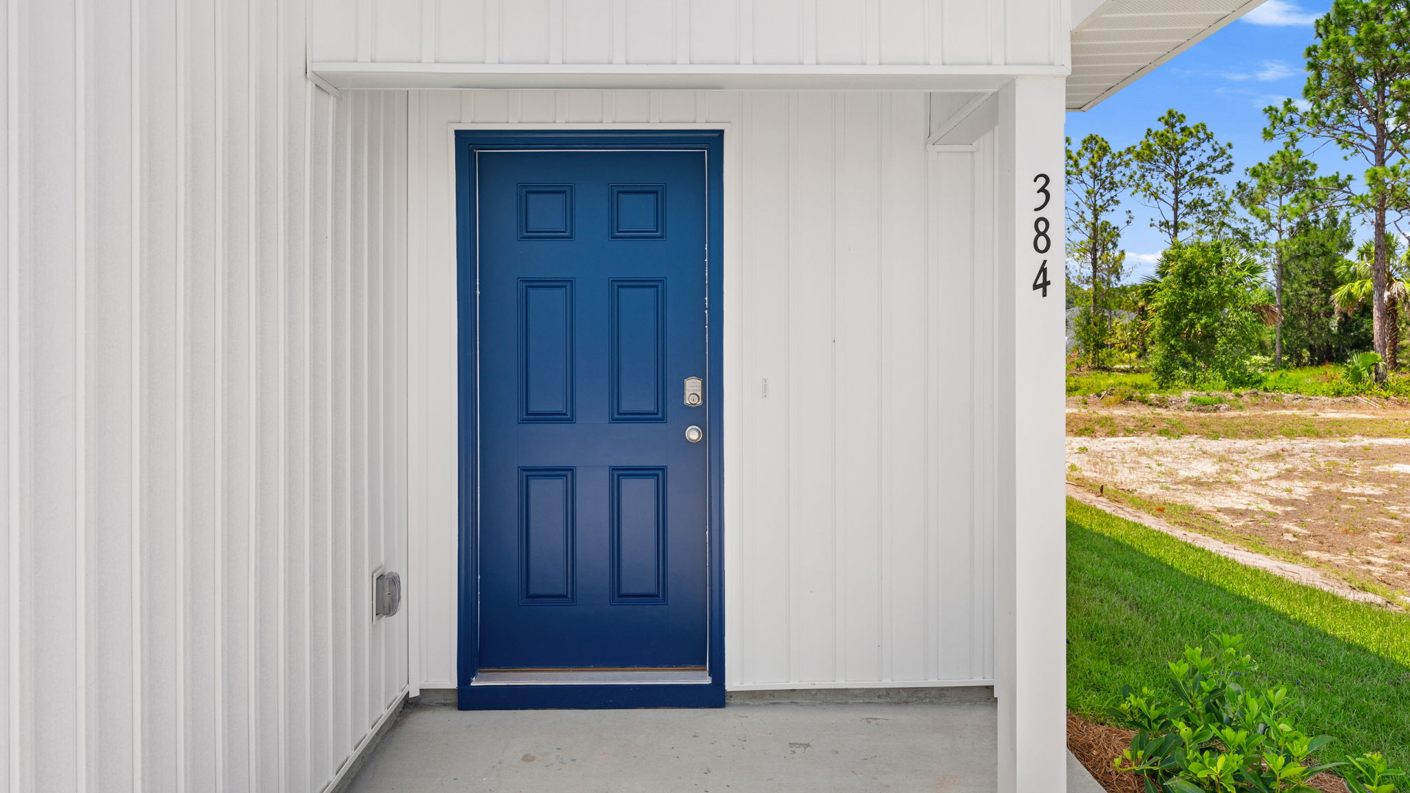Front door with covered entrance.