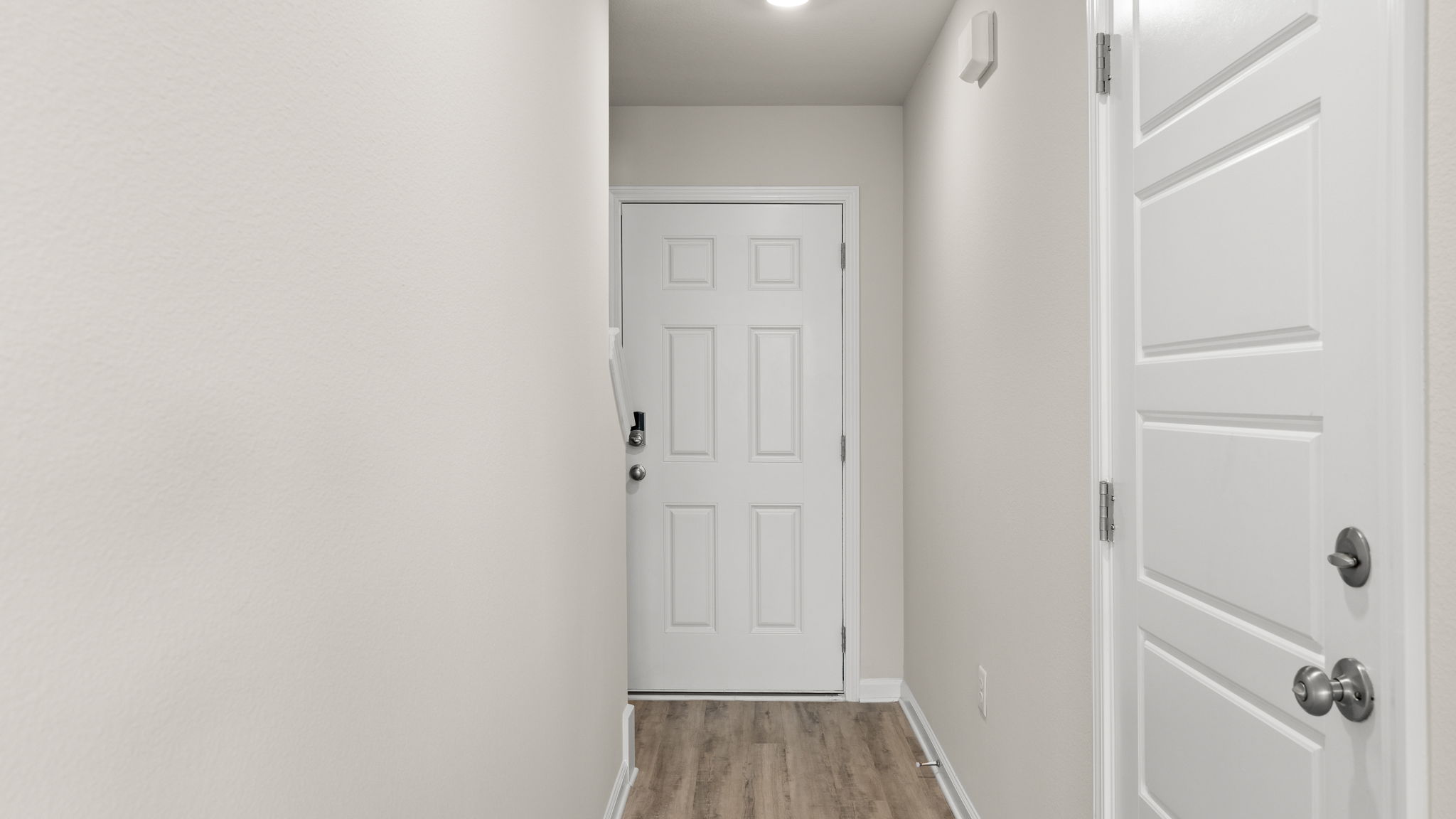 Front entrance with front door.