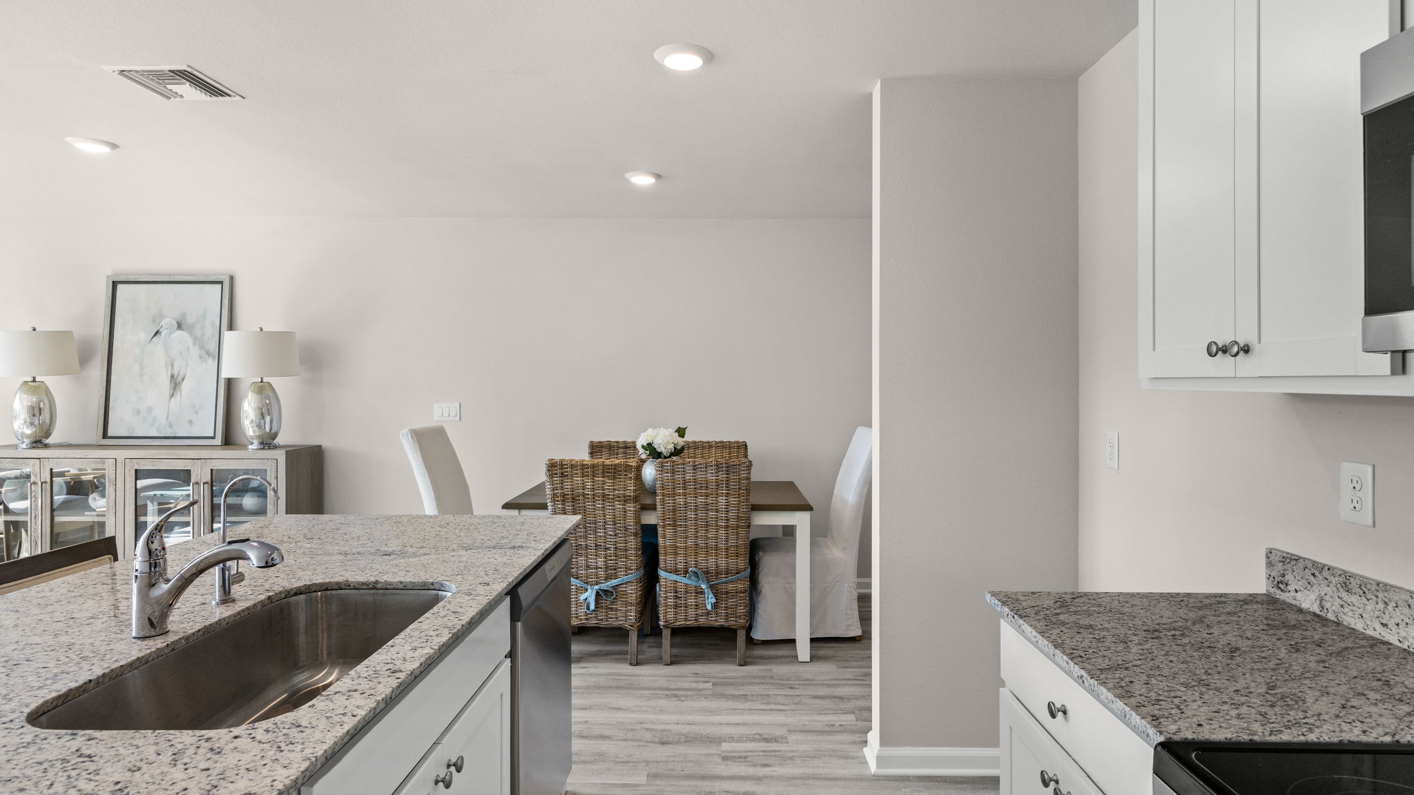 Kitchen with granite countertops and stainless-steel appliances.