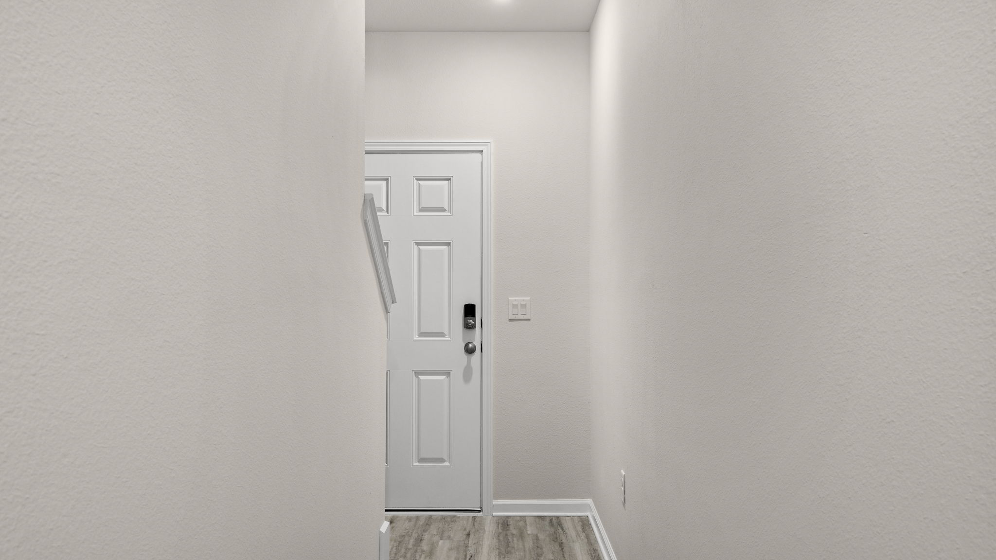 Front entrance with front door.