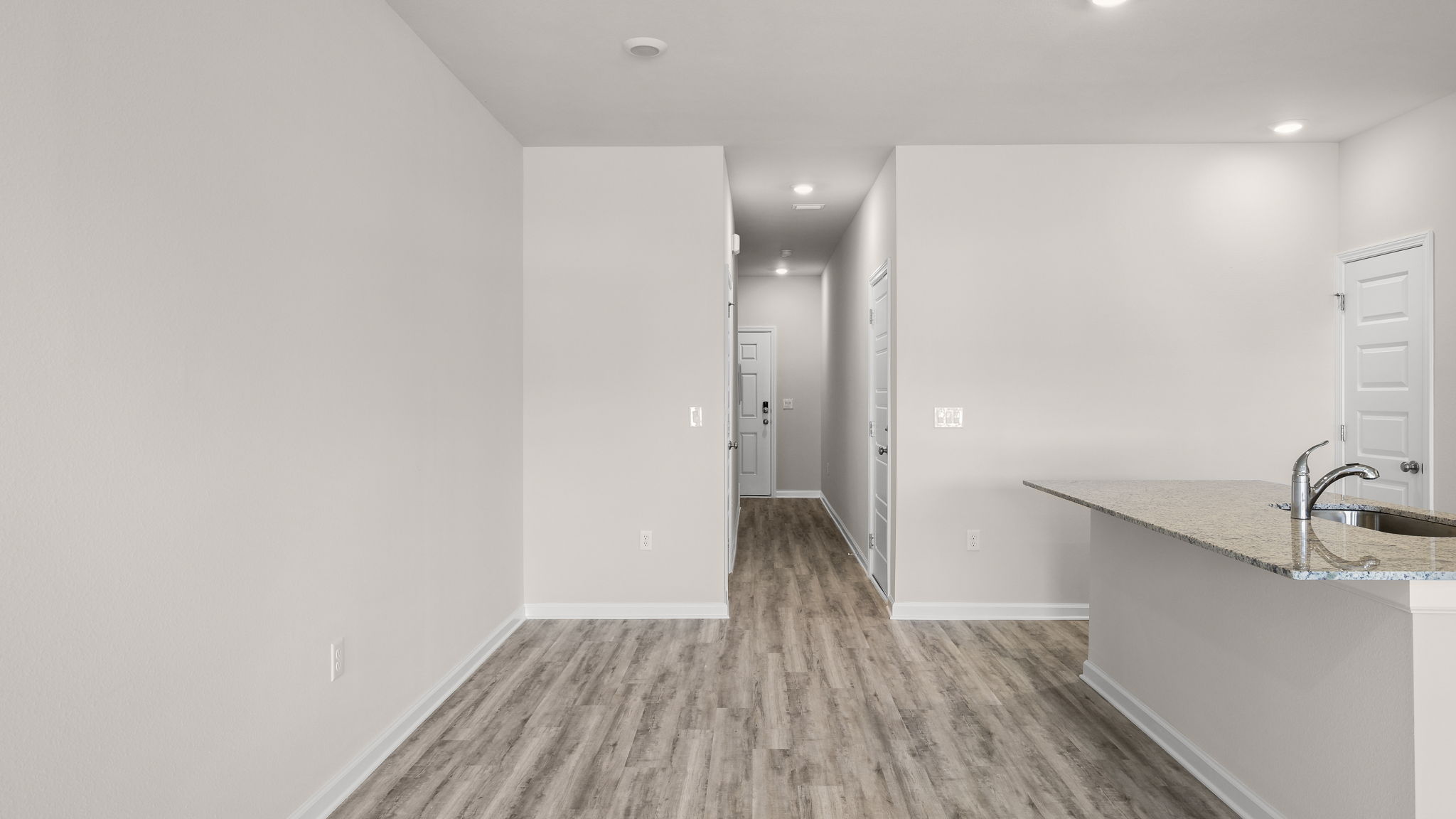 Dining area next to hallway.
