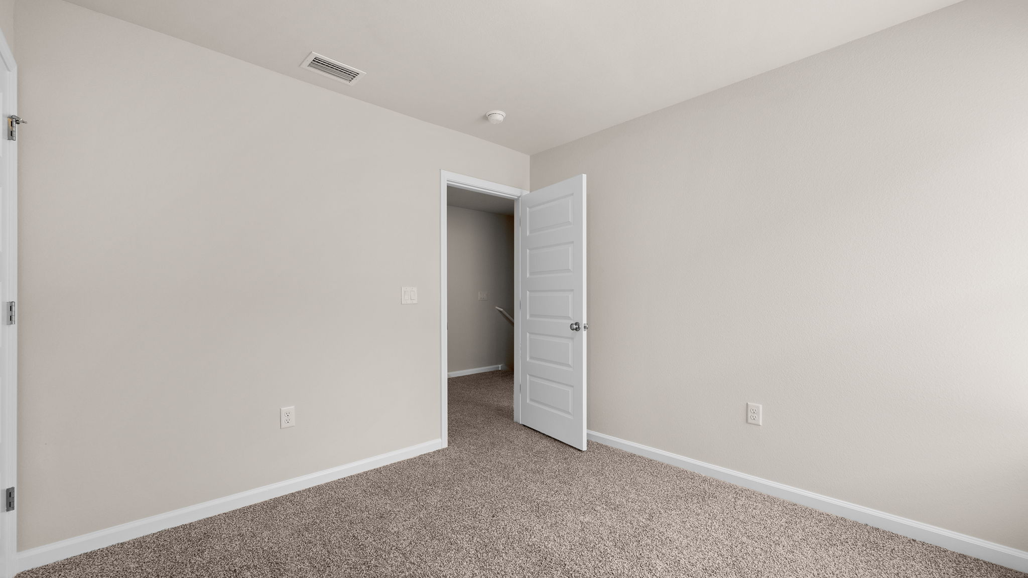 Bedroom with carpet floor.