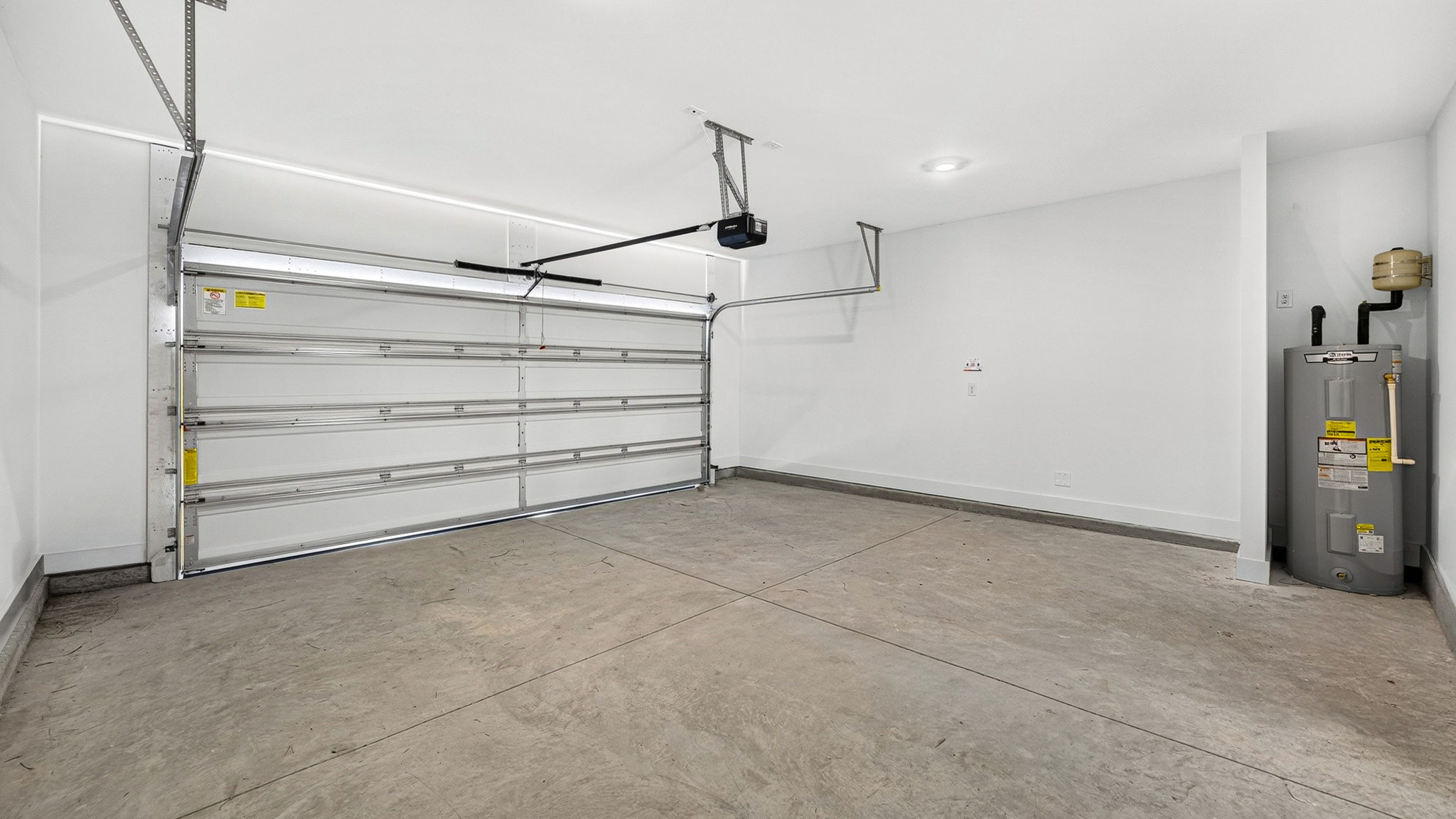Two-car garage and water heater.