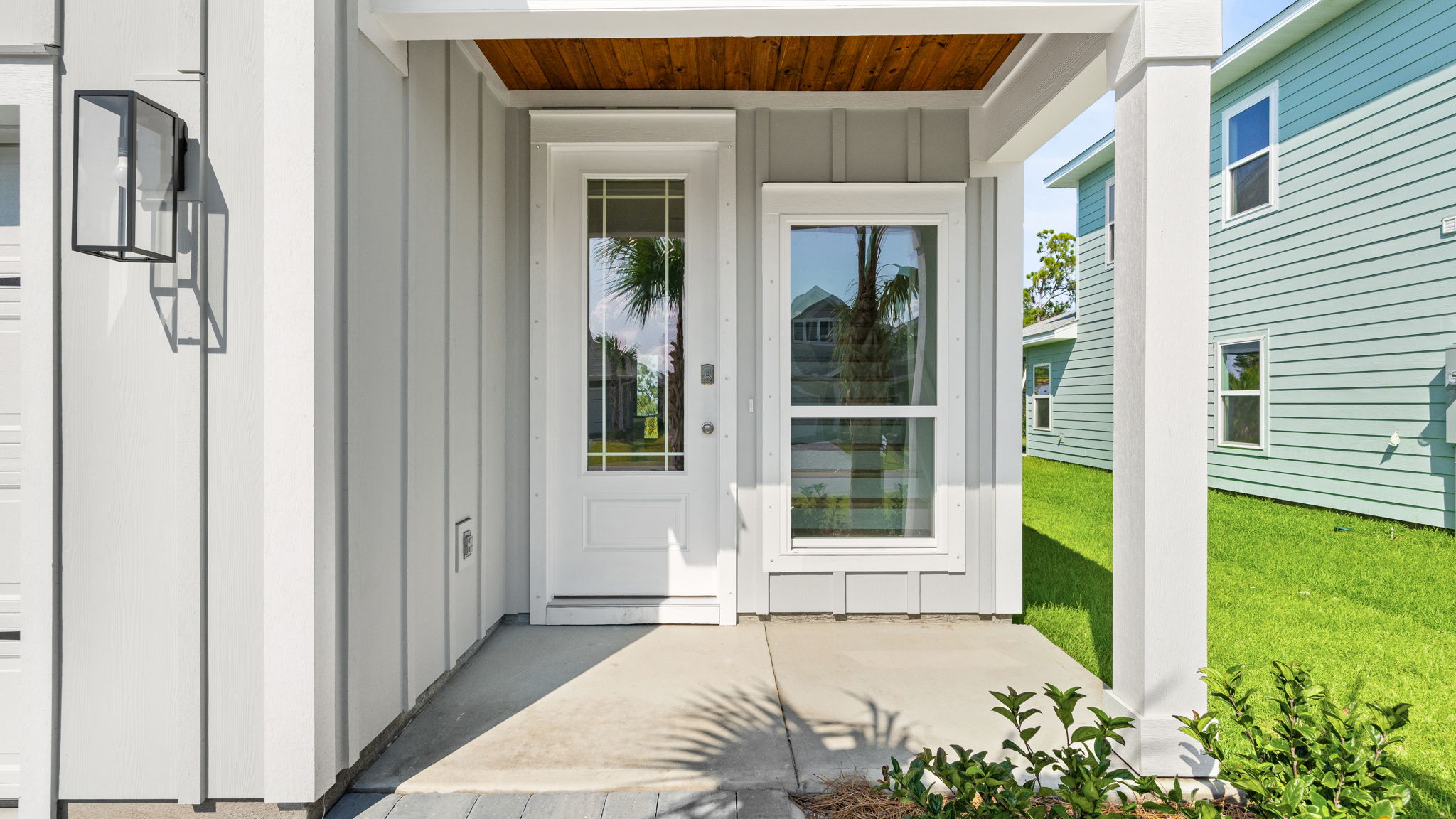 Covered front walkway and front door.