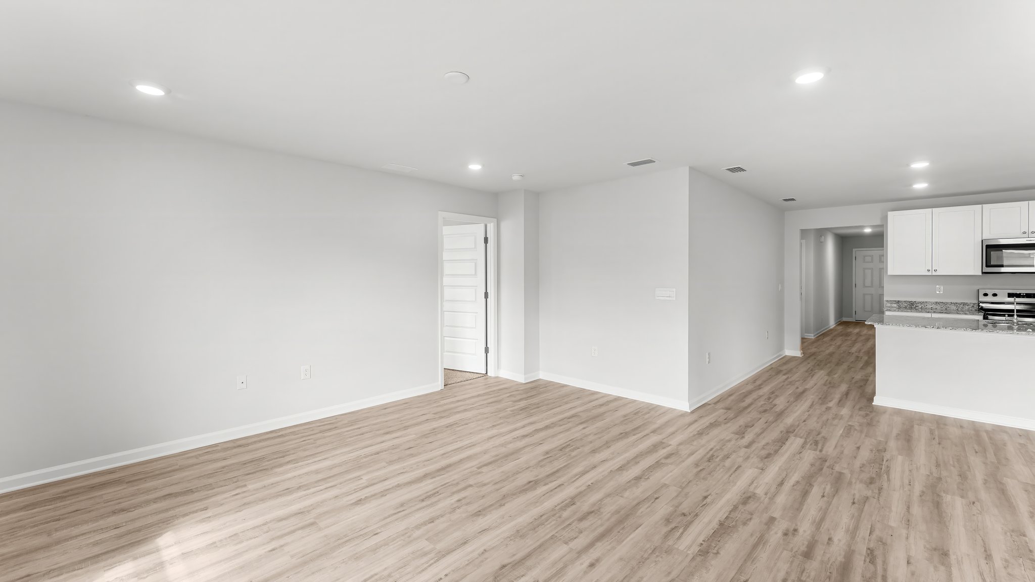 Open living room with EVP flooring.