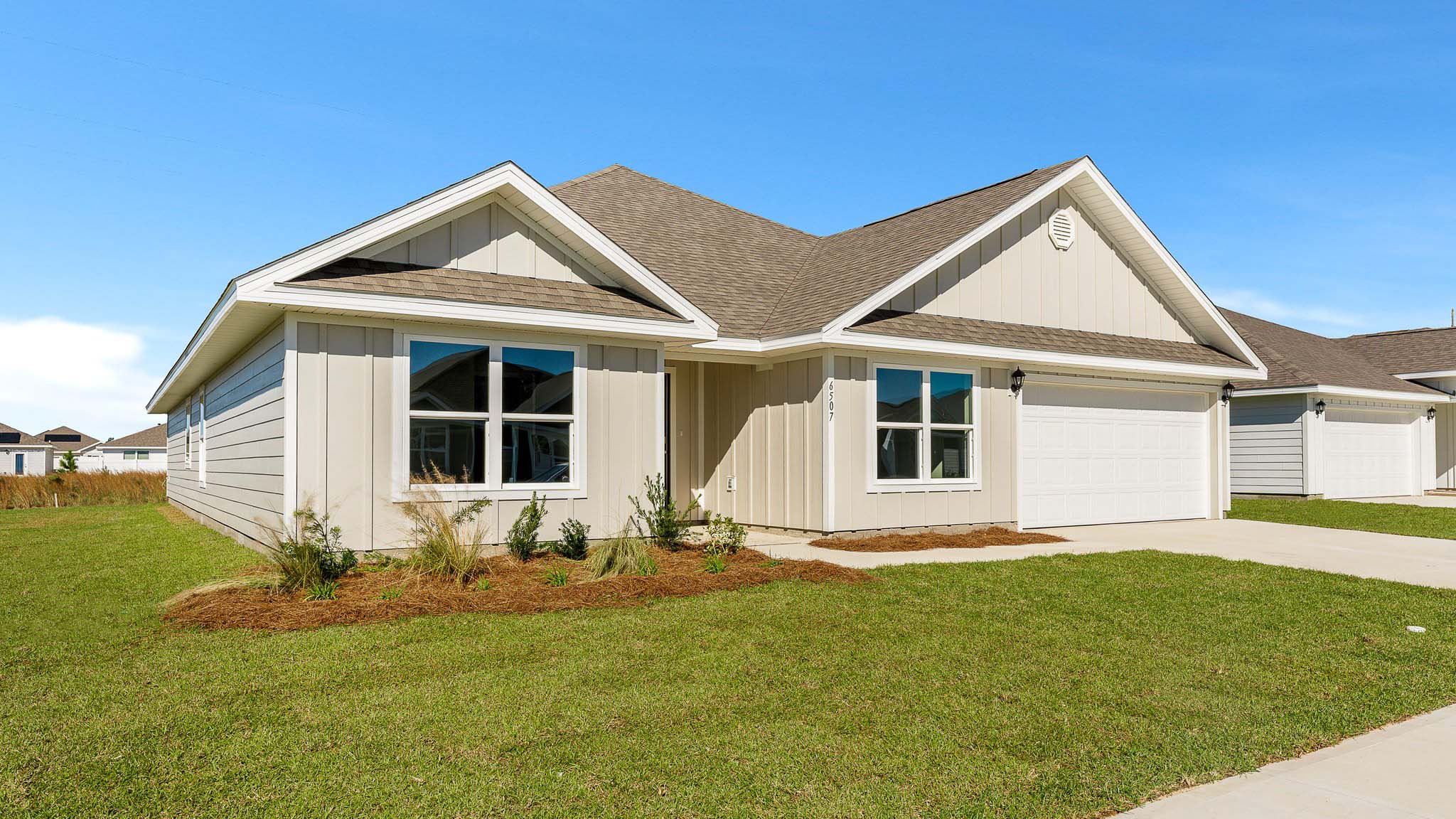 Sawyer floor plan at Destini Lane with Hardie siding and two-car garage.