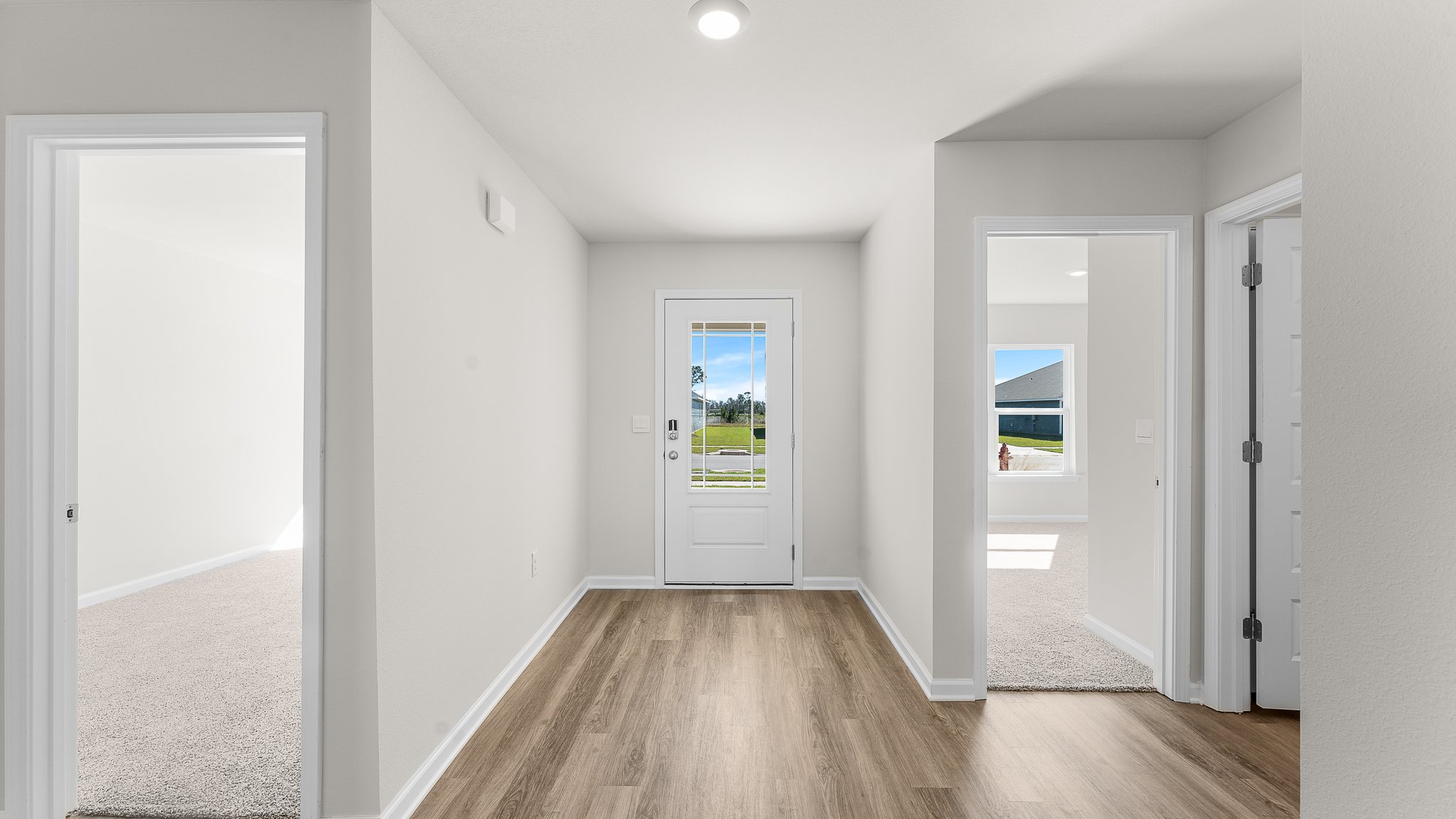 Front entrance hallway next to bedrooms and bathroom.