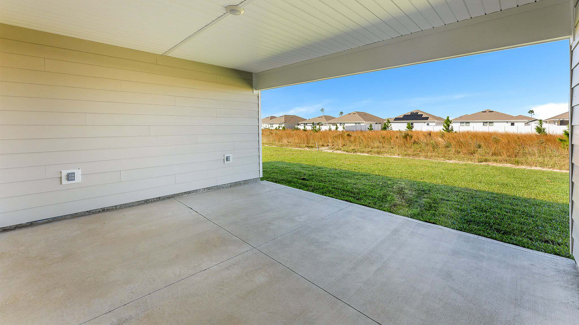 Covered rear patio of Sawyer floor plan at Destini Lane.