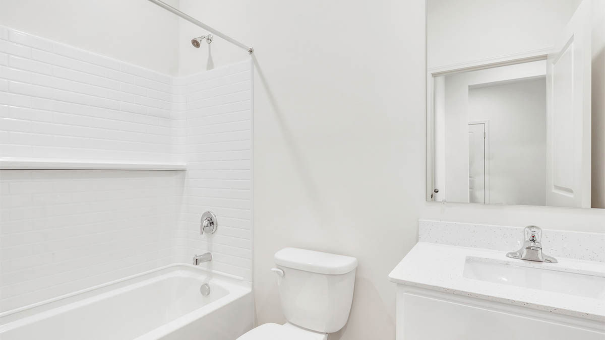 Bathroom with one sink and shower.
