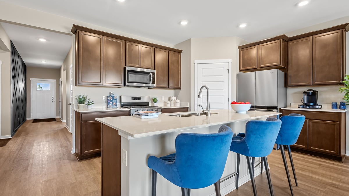 Kitchen with flagstone cabinetry and hard wood flooring.