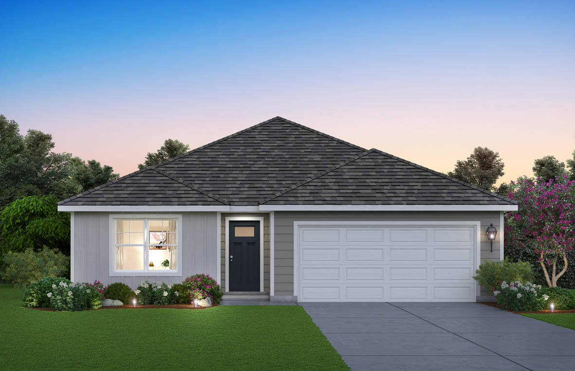 front exterior home with stucco exterior and a two car garage