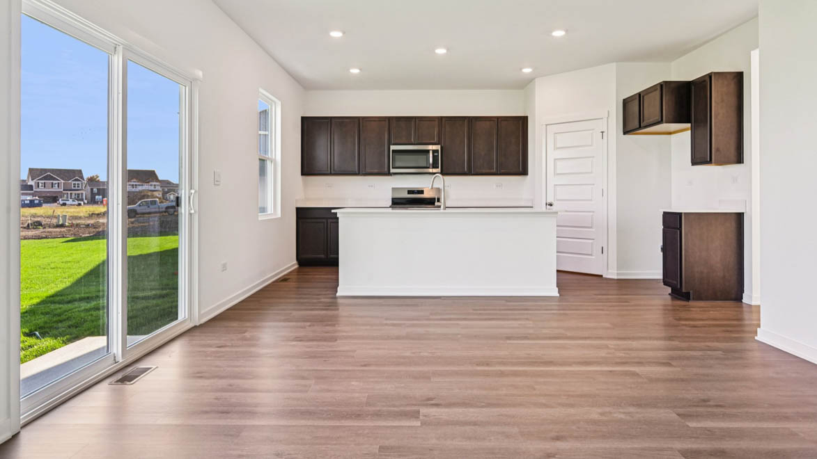 Dining area with sliding glass doors.
