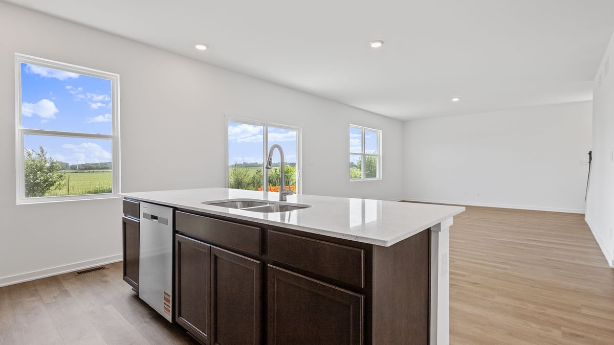 Kitchen island with a side window and viewing living area.