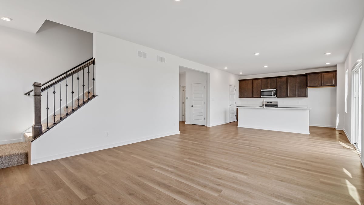 Living room area with hard wood flooring.