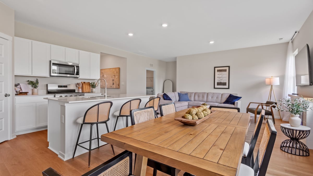 Dining area with view of living room.