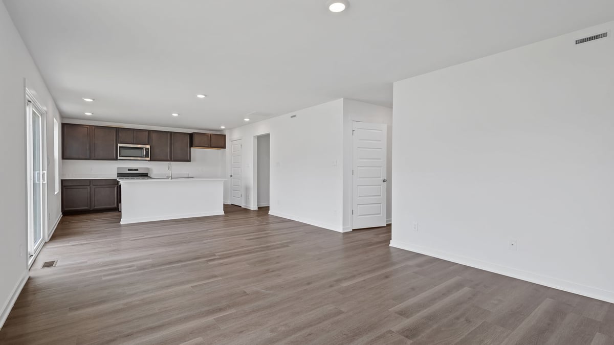 Living room space with ahrd wood floors.
