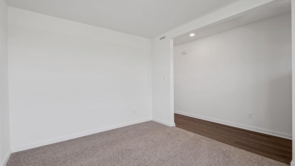 Front room with carpeted floors.