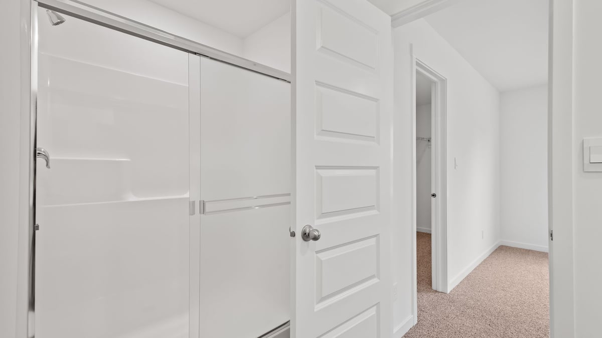 Walk-in shower and a walk-in closet.