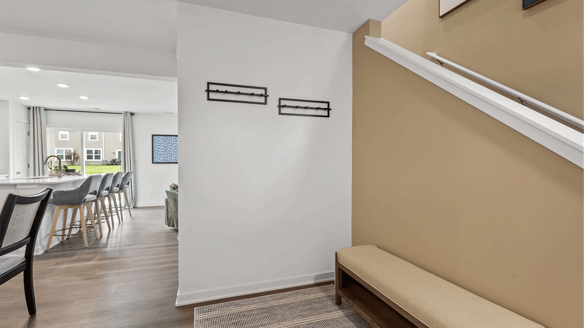 Foyer area leading into kitchen area.