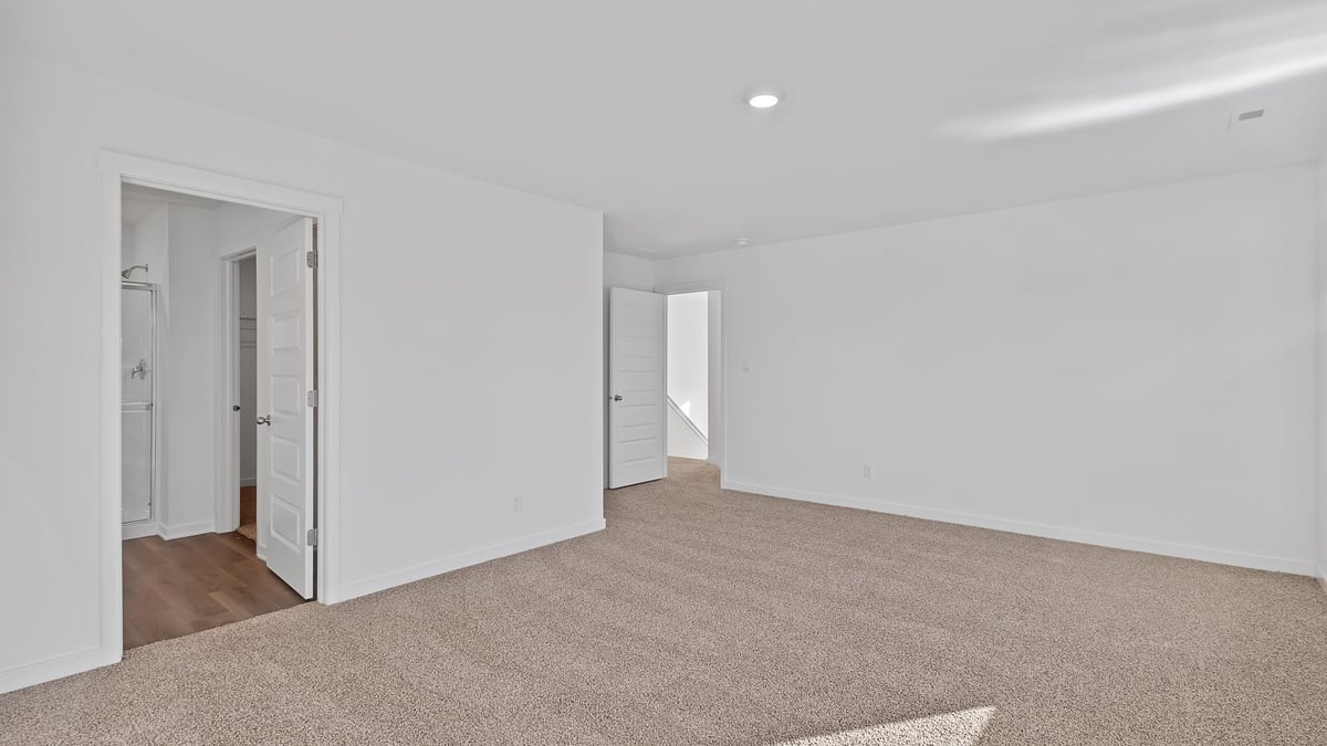 Primary bedroom with plenty of space.