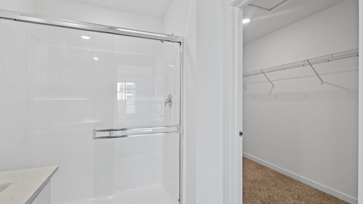 Walk-in shower and a walk-in closet.