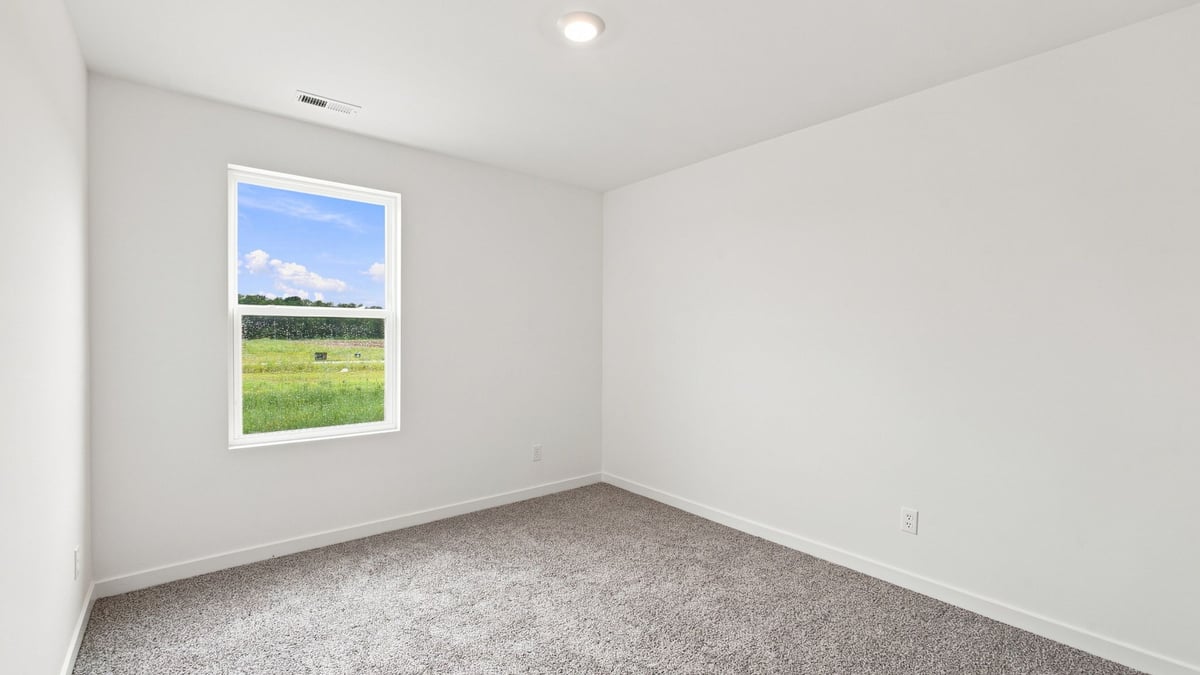Bedroom with side window.