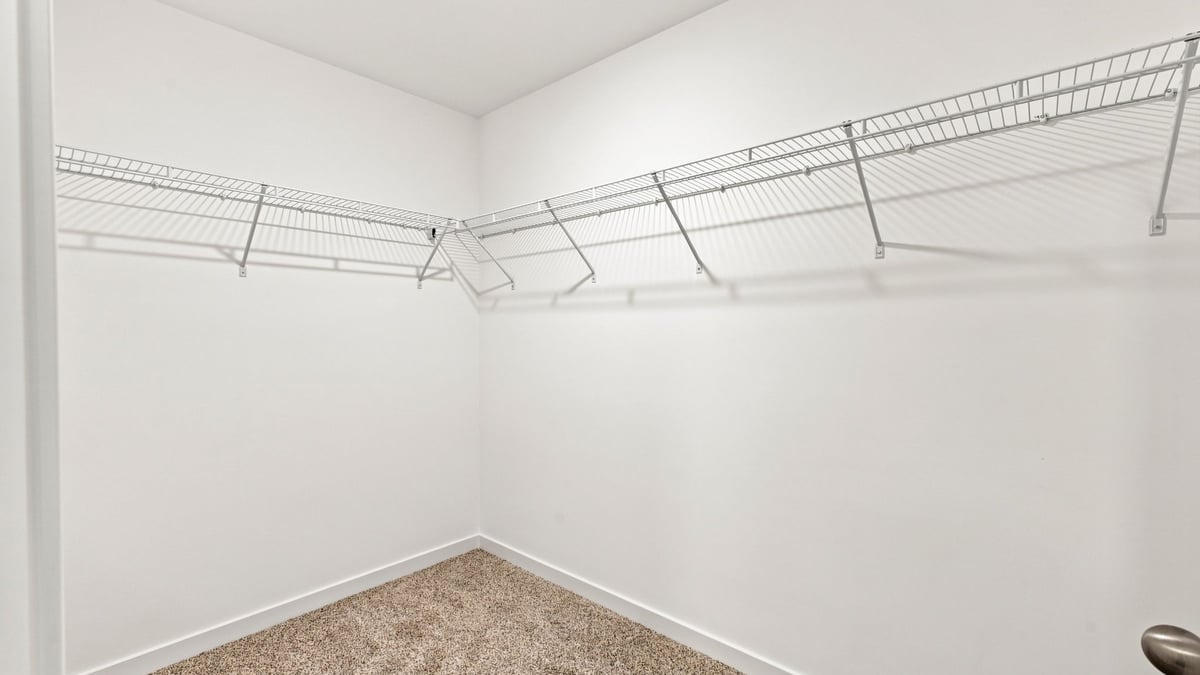 Primary walk-in closet.