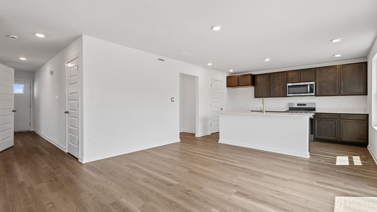Dining and kitchen area with flagstone cabinetry.