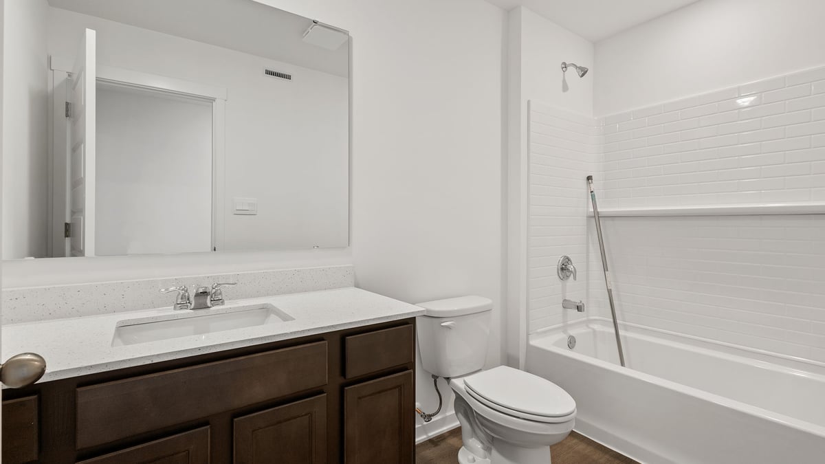 One vanity sink with shower.