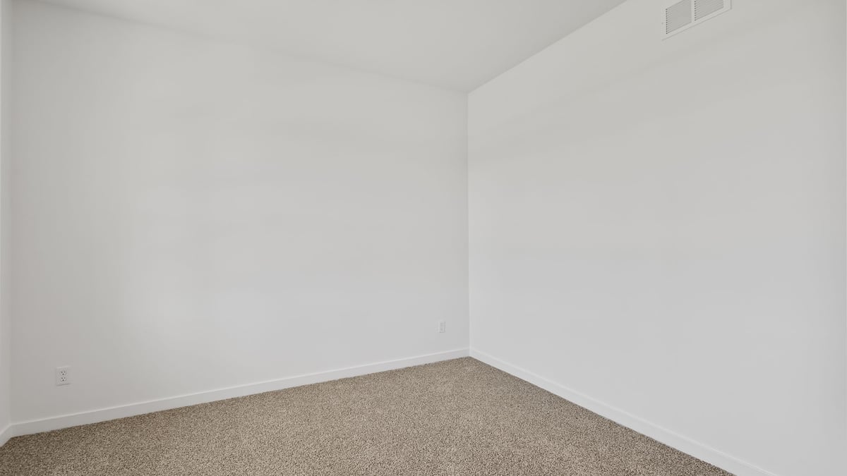 Front room with carpet.