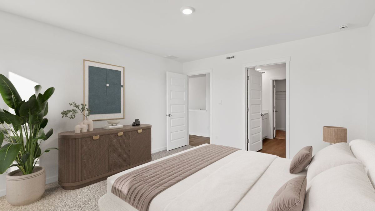 Primary bedroom with own bathroom suite.