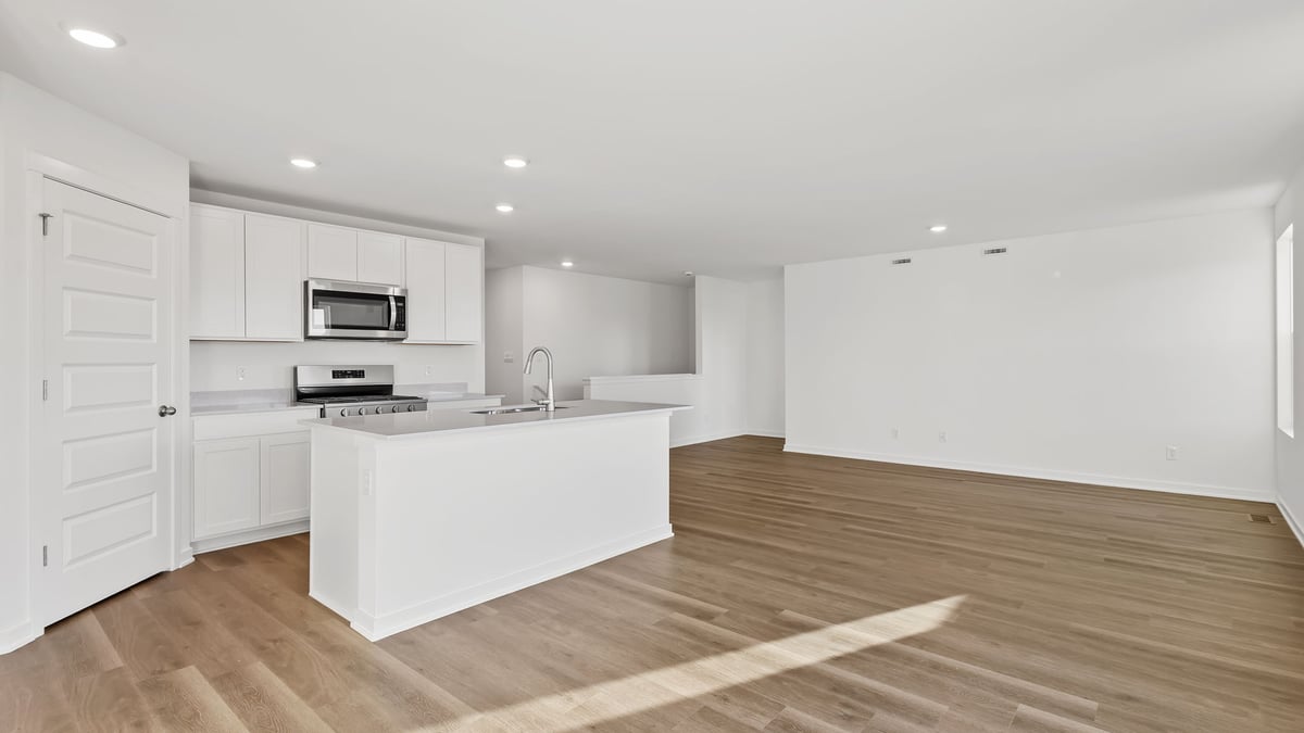 View of kitchen and living room from the dining area.