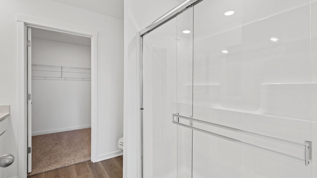Walk-in shower and closet.